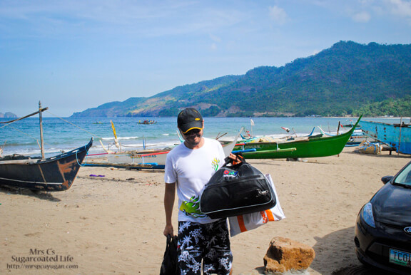 Mr C carrying our stuff in.